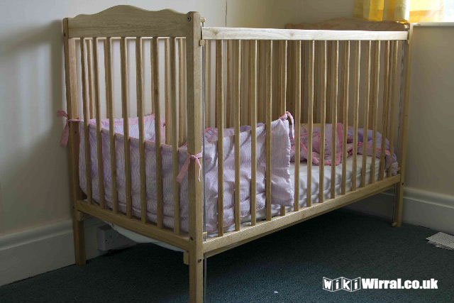 Attached picture Baby Cot (1 of 1).jpg